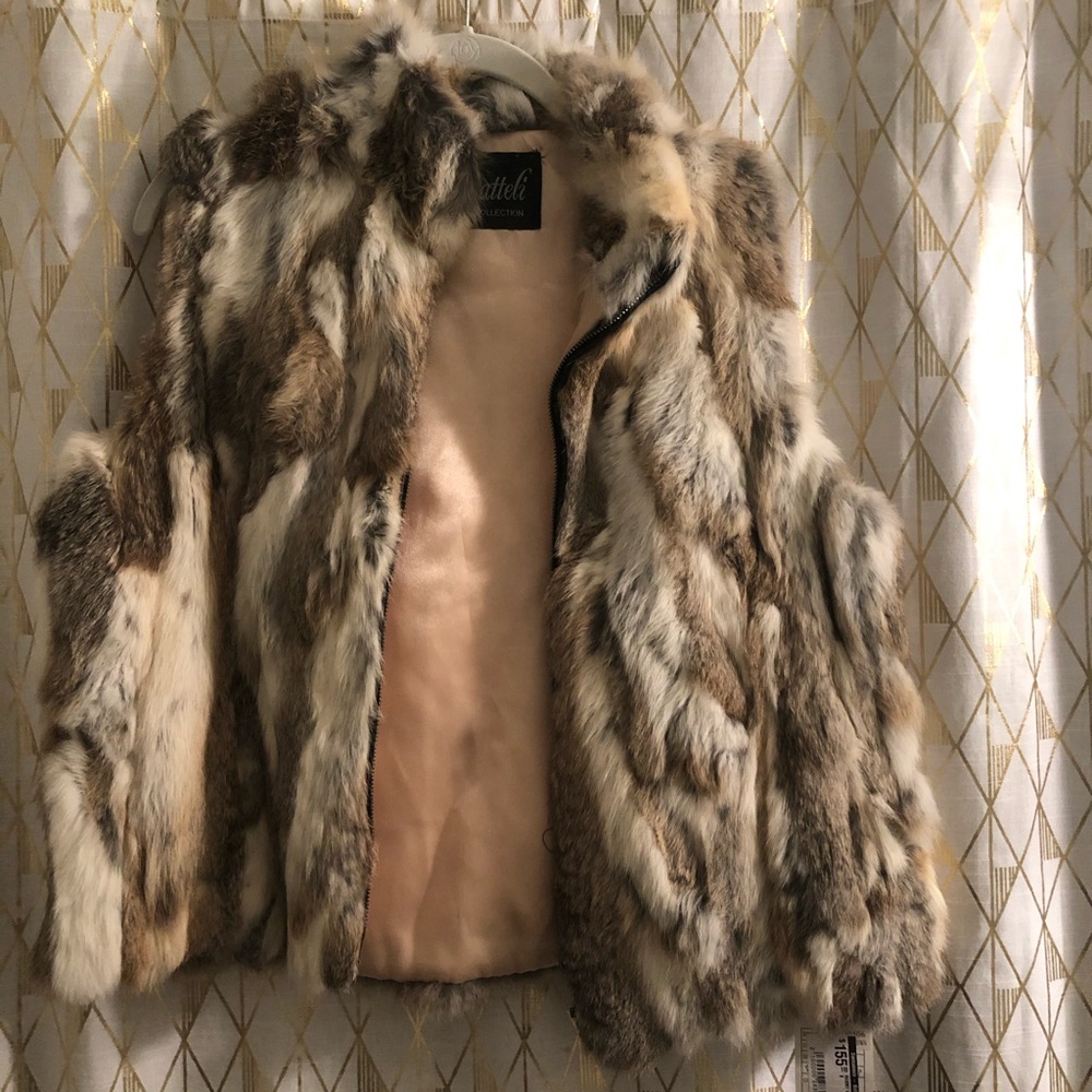 Never worn 100% real Rabbit Fur vest!